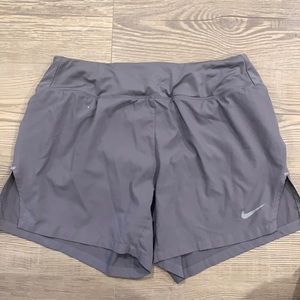 Grey Nike running shorts